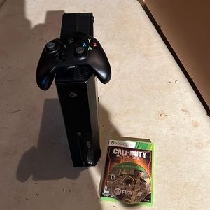 Xbox One with all cords and controller.